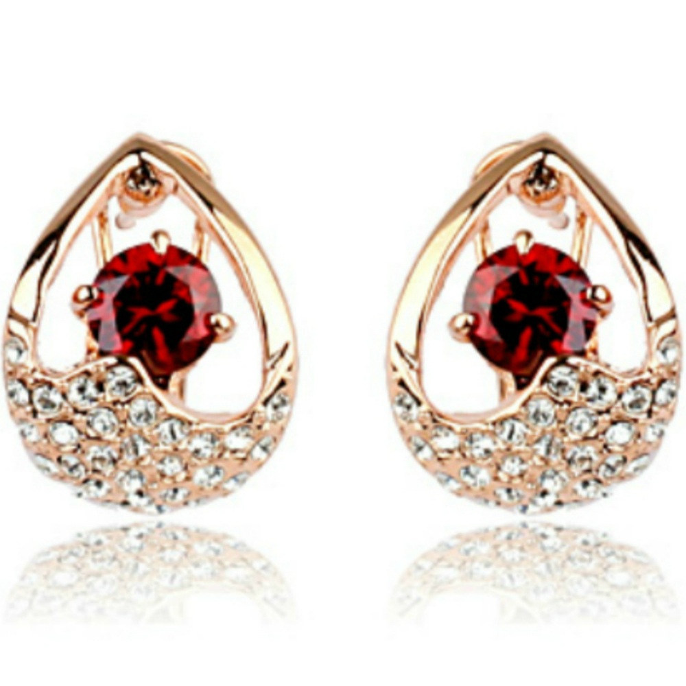 Red drop shaped omega back earrings with 18ct rose gold finish
